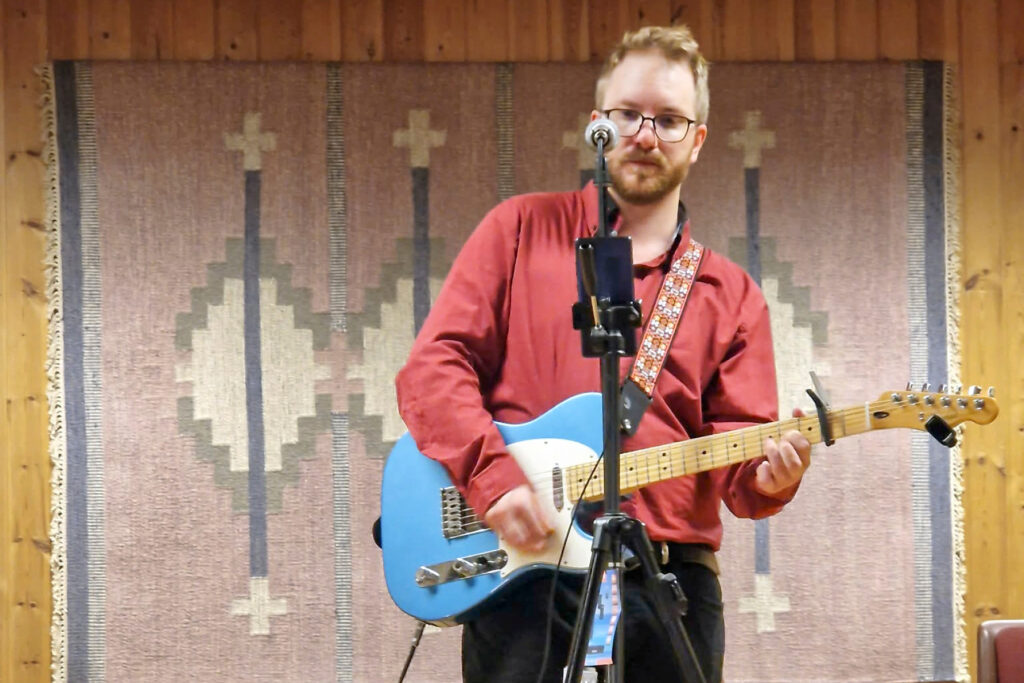 Mann med gitar